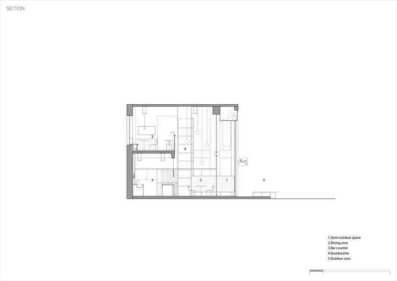 Section drawing showing interior spatial relationship between dining area, bar counter, bathroom, and an outdoor space