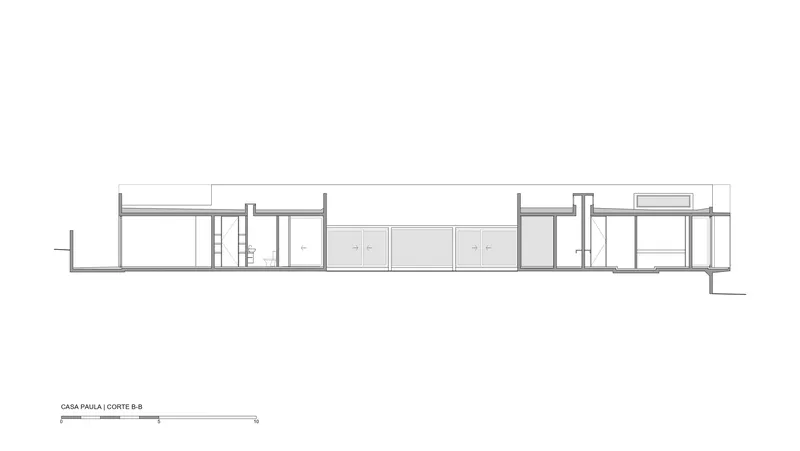 Longitudinal section drawing revealing stairwells and room divisions under the horizontal roofline