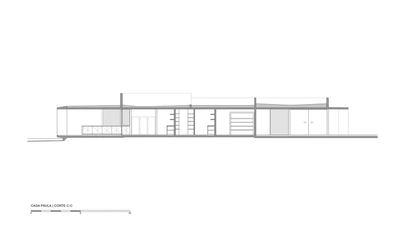 Section drawing showing staircases and ceiling heights across the linear plan