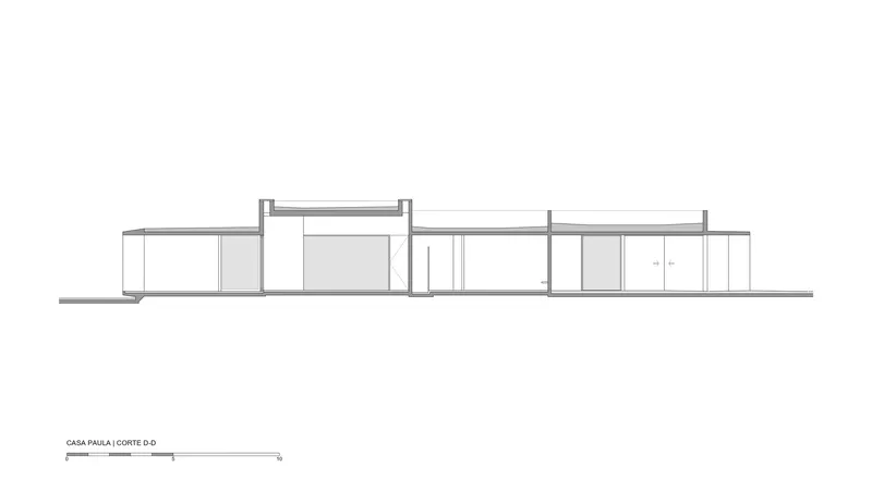 Elevation drawing showing a low horizontal volume with varied roof heights and a central raised element