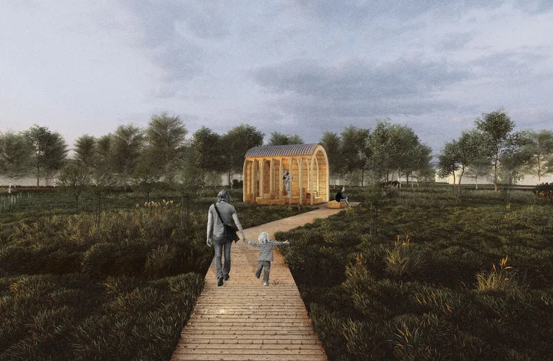 Timber walkway leading to the barrel-vaulted straw pavilion set among low vegetation and trees