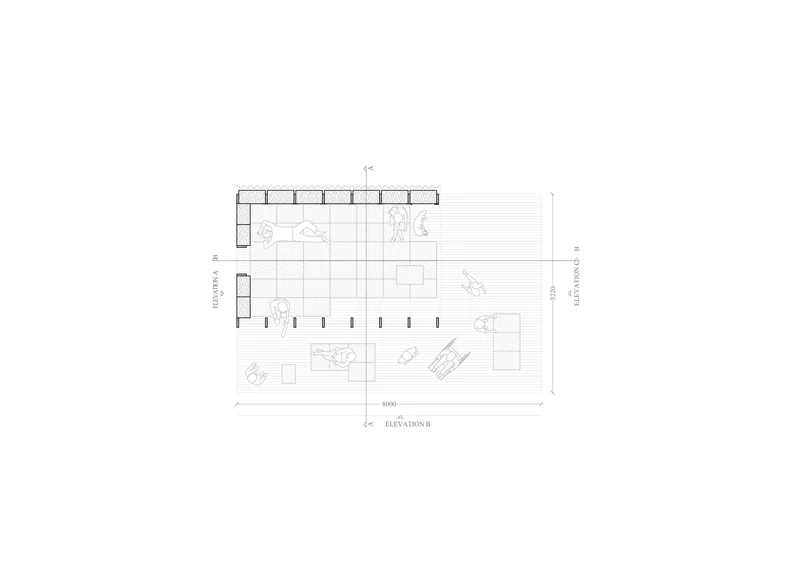 Floor plan drawing depicting an open interior space with furniture and a gridded floor pattern