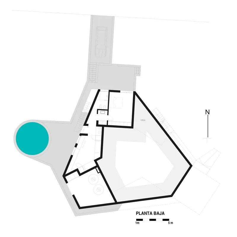 Ground floor plan drawing showing angular volume wrapping a central courtyard with circular pool to the left