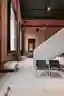 Objekt Architecten Pours a Concrete Disc Through an Aalst Weaving Mill Turned Showroom