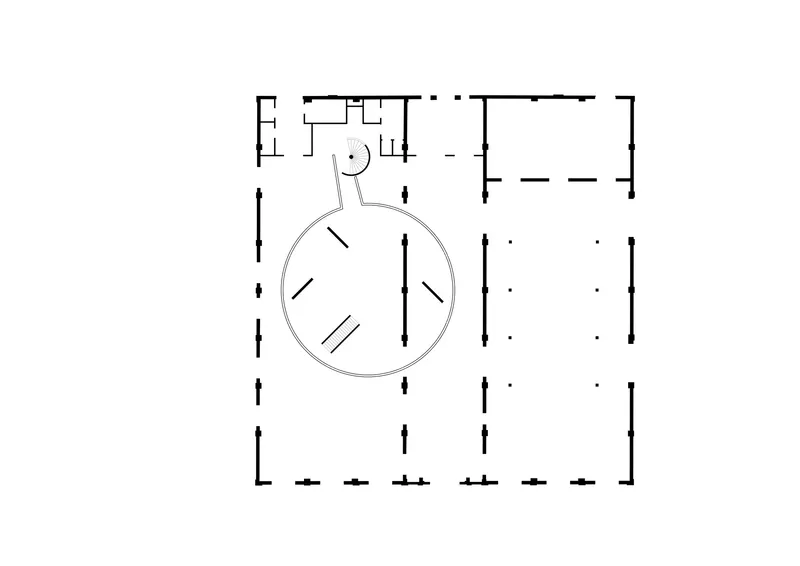 Floor plan drawing showing rectangular perimeter with circular central volume and column grid