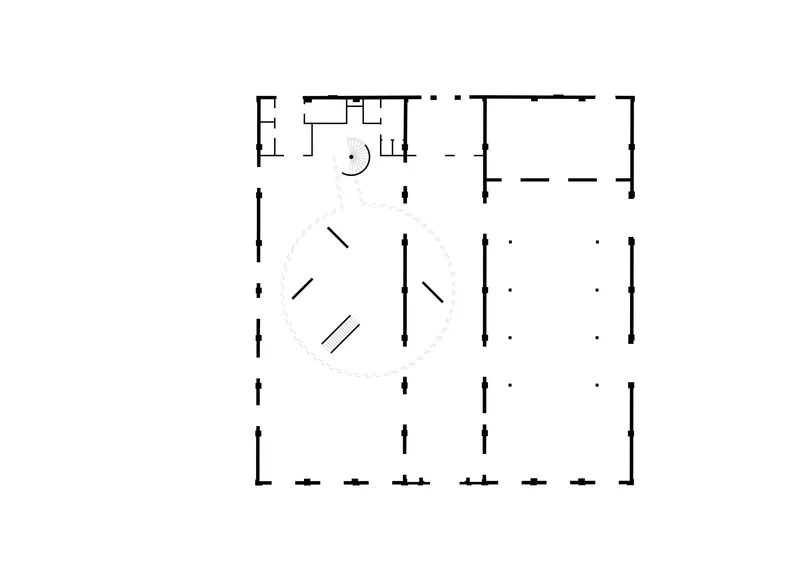 Floor plan drawing showing the circular space with diagonal display elements and secondary rooms along the perimeter