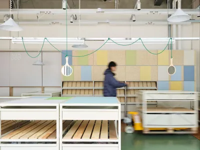 amass studio Turns a 70-Square-Meter Sock Shop in Chengdu into a Miniature Factory Floor