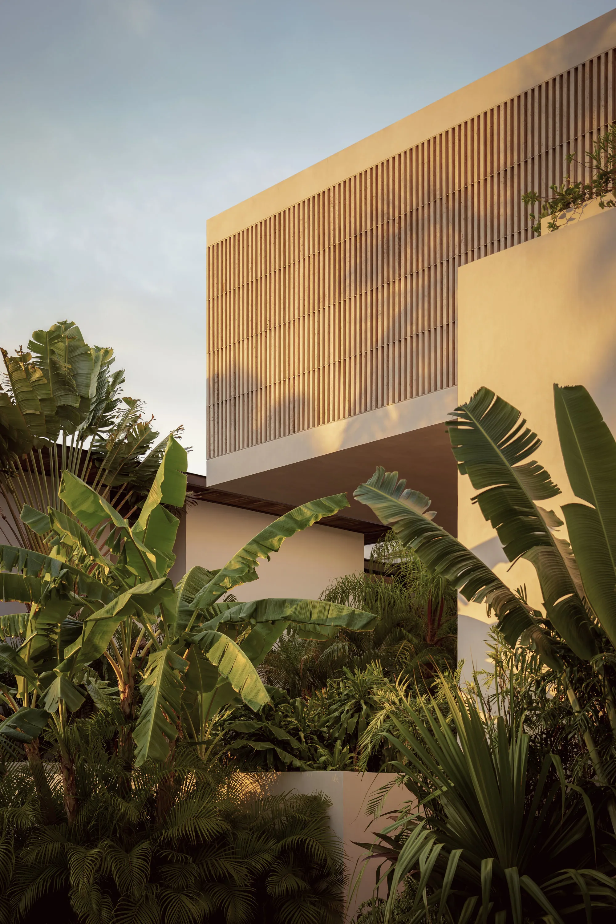 REIMS 502 Wraps a Cancún Family Home in Timber Screens and Interior Courtyards
