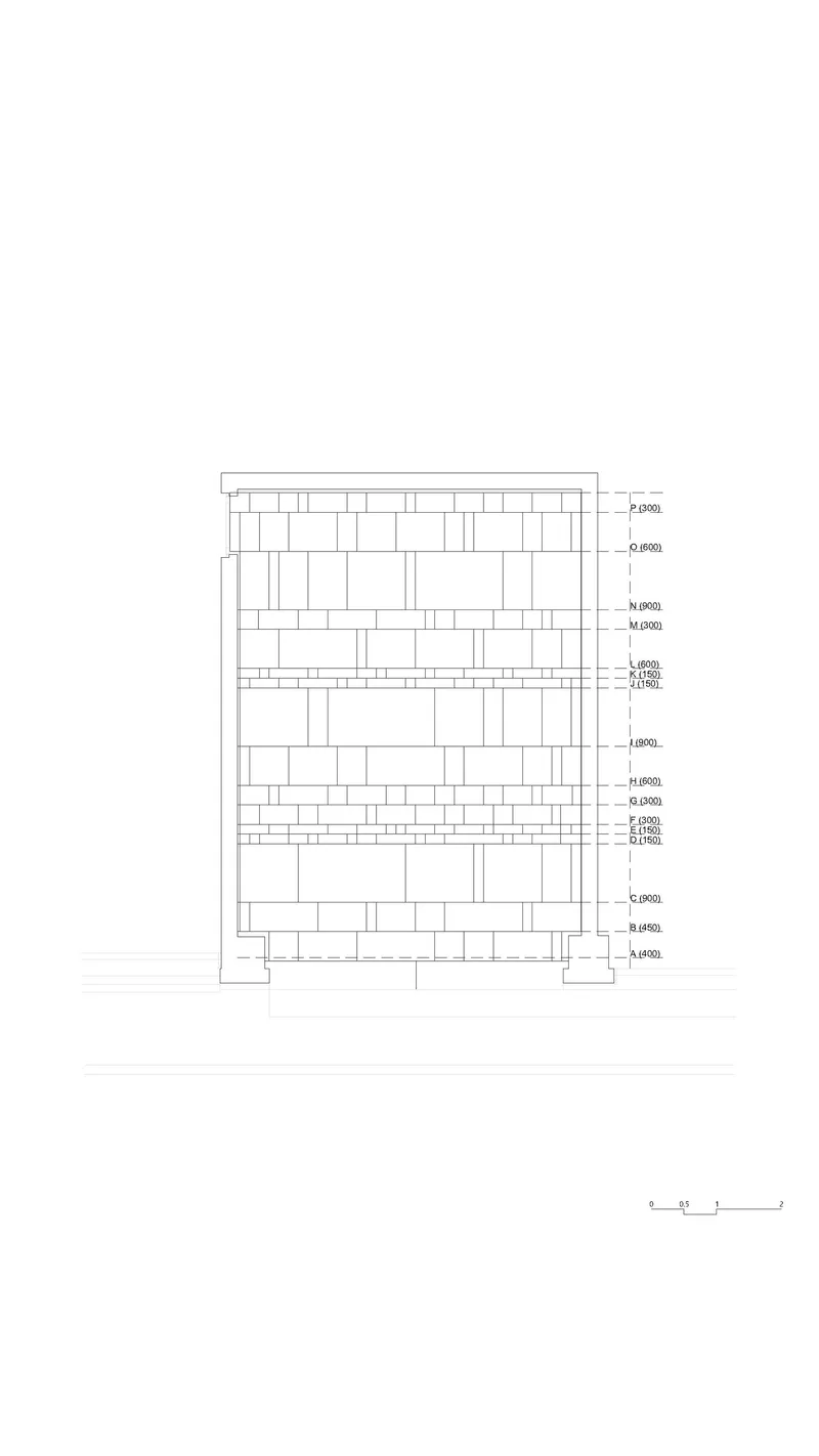 Elevation drawing displaying a masonry wall pattern with varied block sizes and annotated floor levels