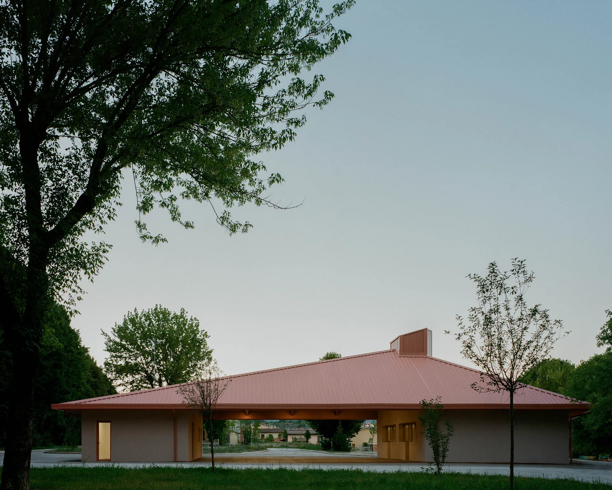 Caret Studio Gives a Tuscan Town Its Living Room Back with a Pink Glulam Pavilion