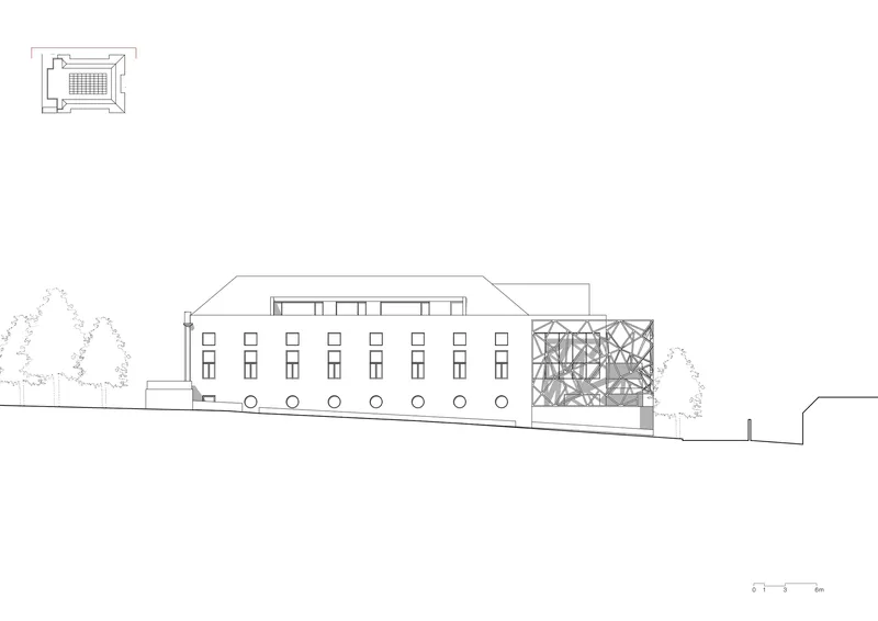 Elevation drawing showing the linear wing with regular fenestration and diagonal braced structural frame at one end