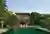 DADA Partners Wraps a New Delhi Residence Around a Ficus Tree in a Prairie-Inspired Plan