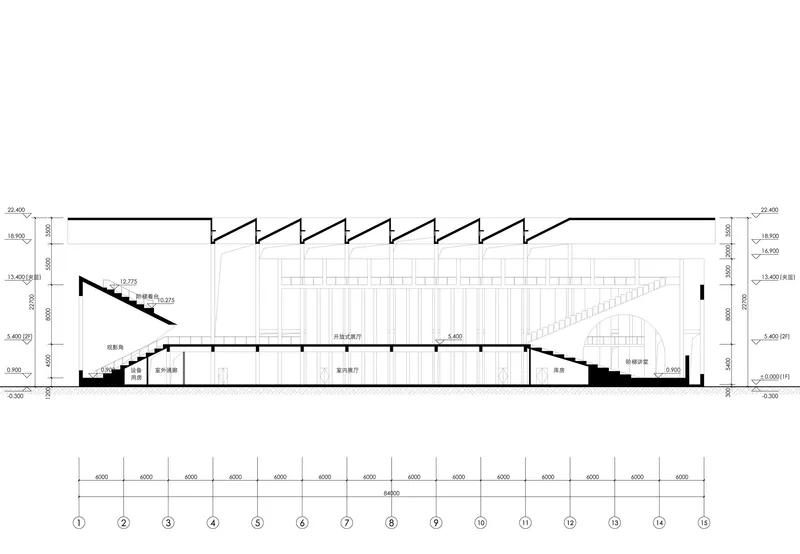Building section drawing showing sawtooth roof profile over central hall with stepped seating and interior spatial relationships