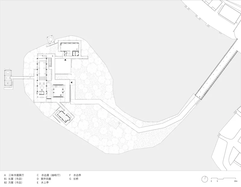 Site plan drawing showing building footprint and tree-dotted landscape on a curved parcel