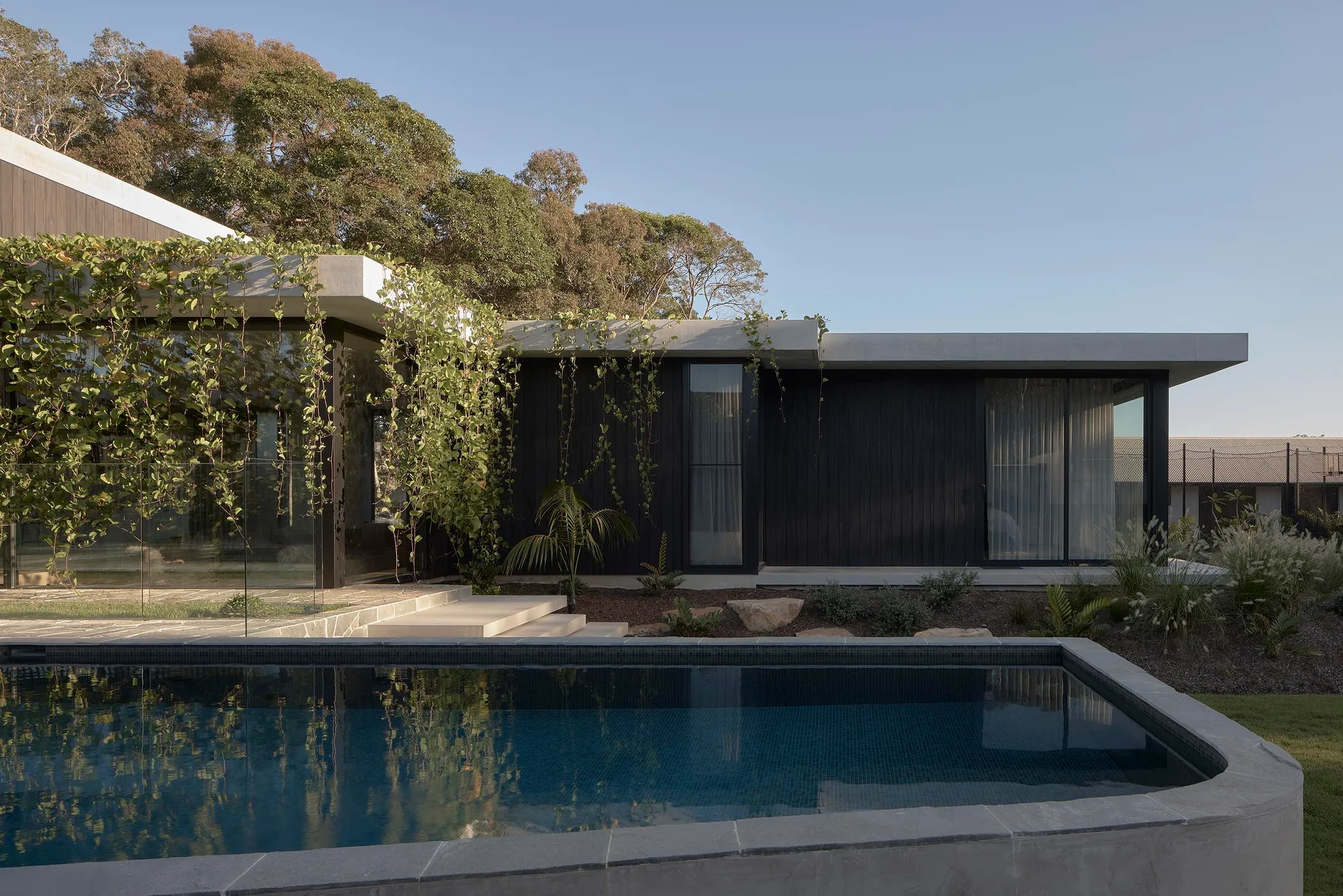 Hive Architecture Wraps a Courtyard House in Charred Timber on the Sunshine Coast