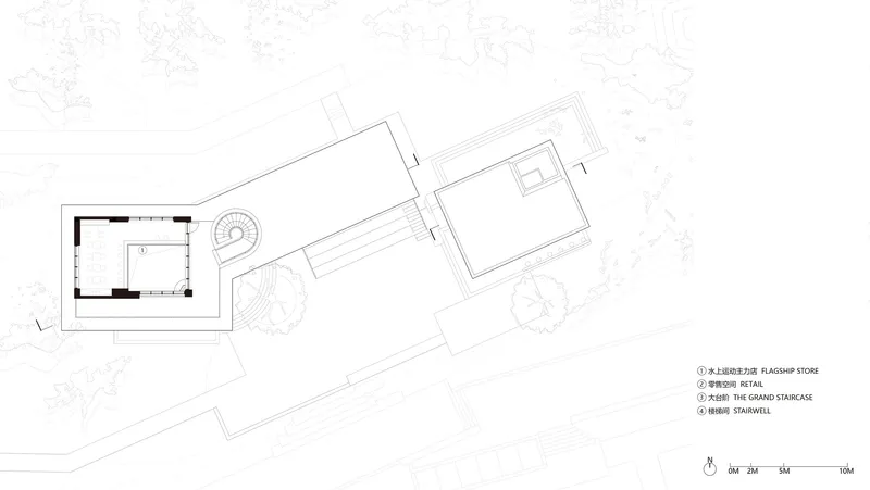 Site plan drawing showing a rectangular building with a circular element and adjacent structures surrounded by trees