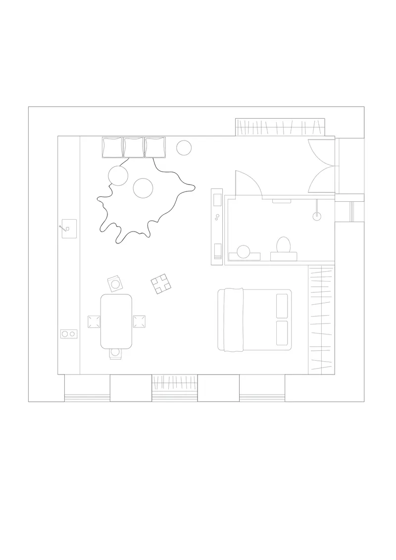 Floor plan drawing showing an open living space with kitchen, dining table and sculptural partition wall