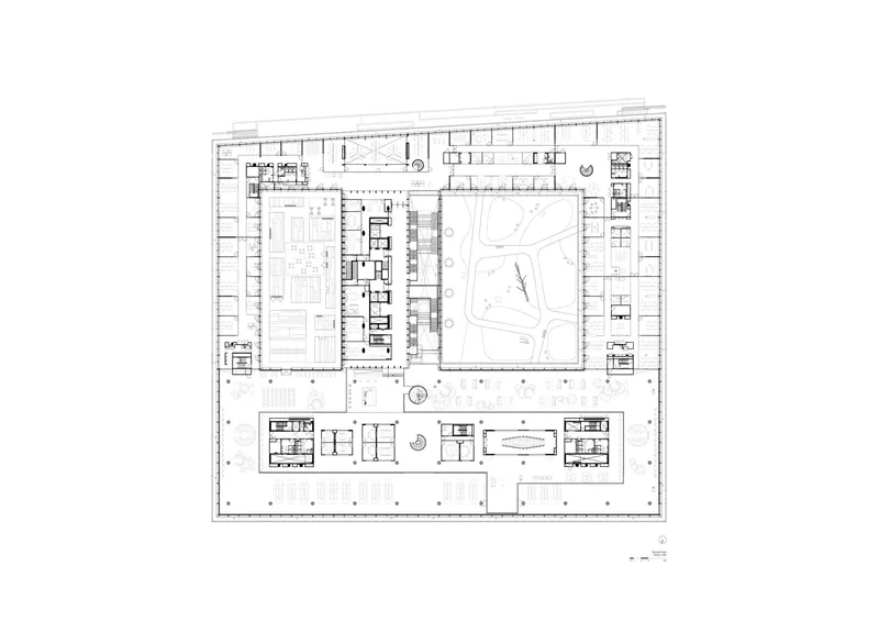 Floor plan drawing showing a square perimeter with central courtyard and surrounding cellular rooms