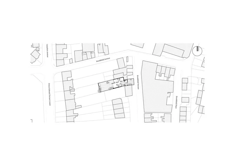Site plan drawing showing the building footprint within its surrounding urban block and street layout