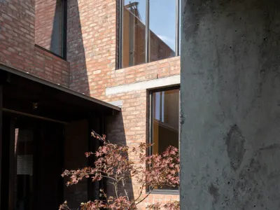 Culligan Architects Weaves a Red Brick Family House into a Dublin Coach House Garden