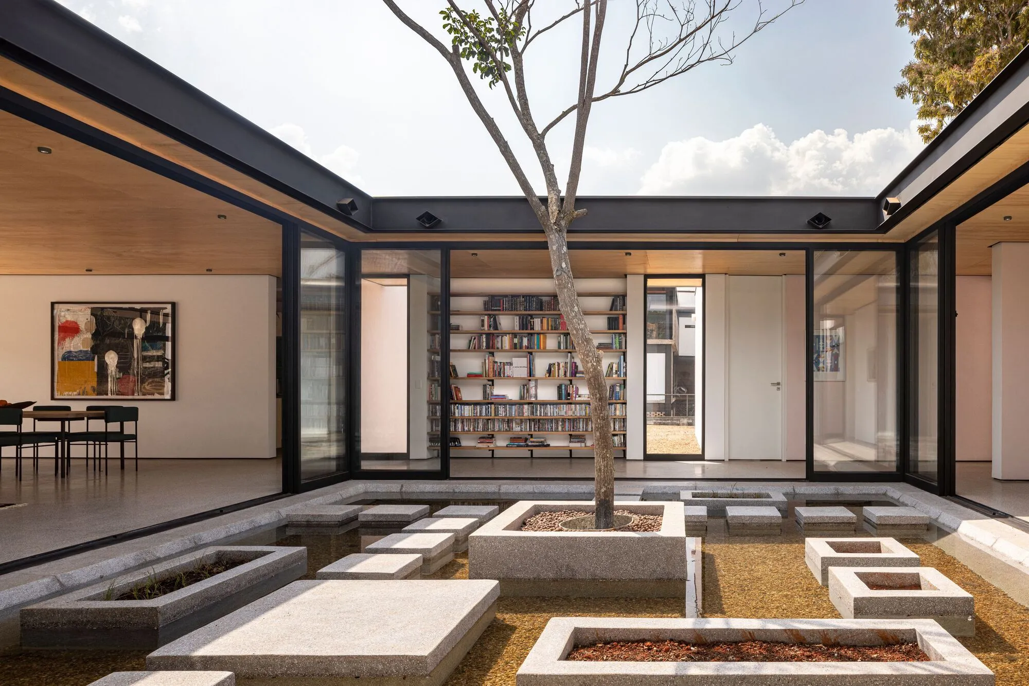 Equipe Lamas Rotates Four Pavilions Around a Rescued Ipê Tree in the Brazilian Cerrado