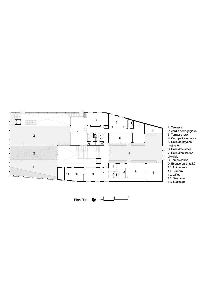 Floor plan showing numbered rooms arranged around a large central space with an angled perimeter