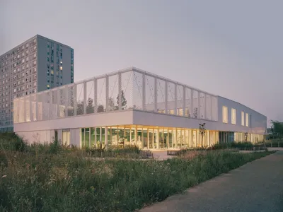 ABC Studio Grounds a Socio-Educational Center in Metz's Borny District with Meadow and Mesh