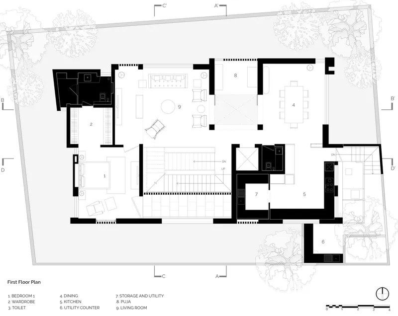 First floor plan drawing showing living spaces organized around a central stair with surrounding trees