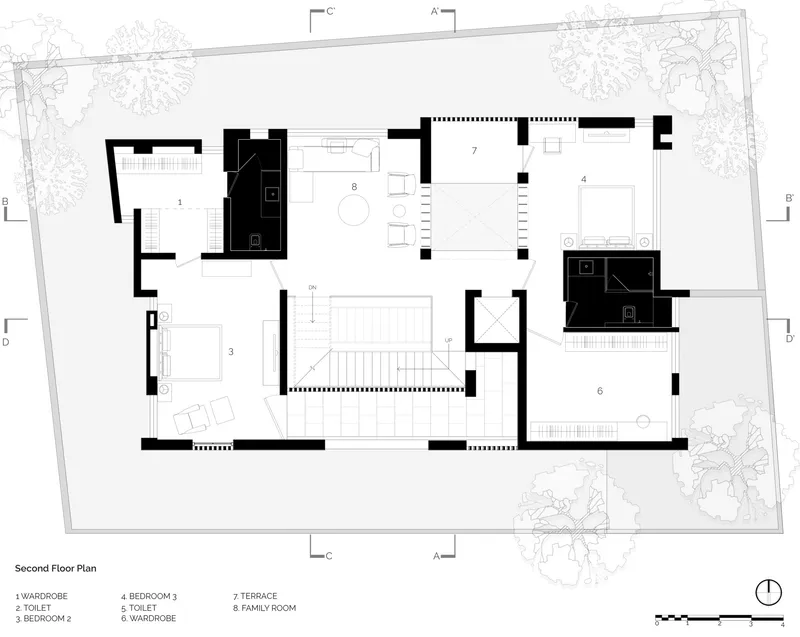 Second floor plan drawing showing bedroom wing and family spaces with central circulation core