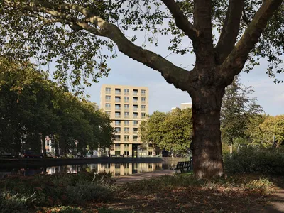 Van Bergen Kolpa Architects Stack 36 Social Homes into a Sculpted Brick Landmark on Rotterdam's River Rotte