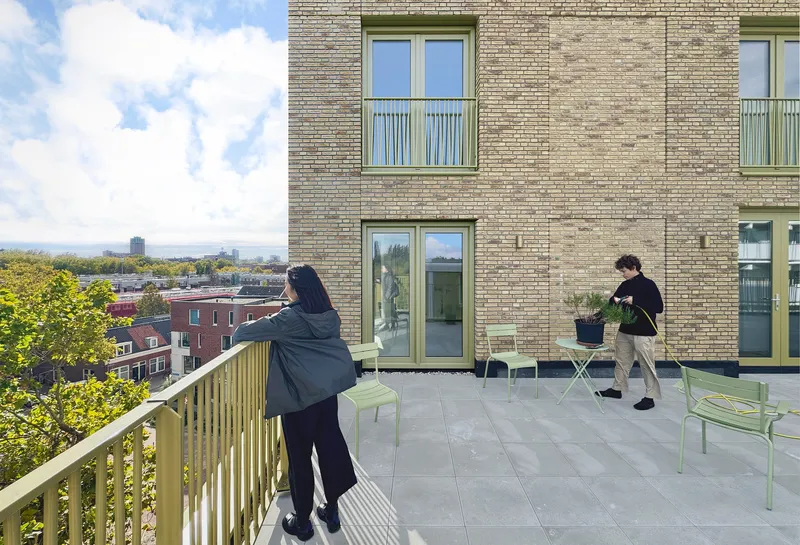 Shared rooftop terrace with pale green railings and two residents among potted plants