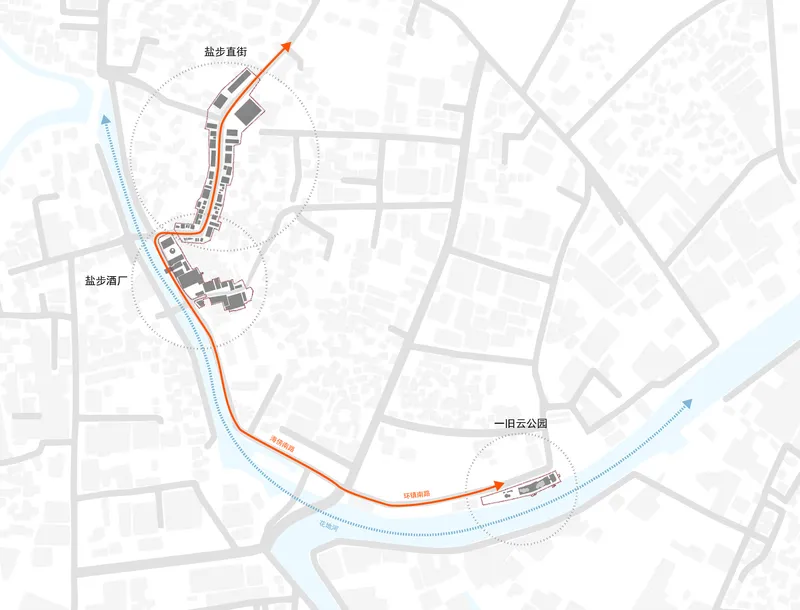 Site plan drawing showing building footprints along a curved pathway beside a river or waterway