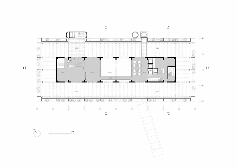 Floor plan drawing showing enclosed spaces at the west end and an angled circulation bridge