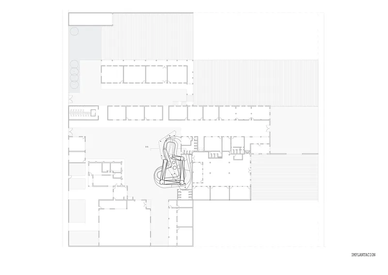 Floor plan drawing showing classroom wings arranged around a central courtyard with play elements