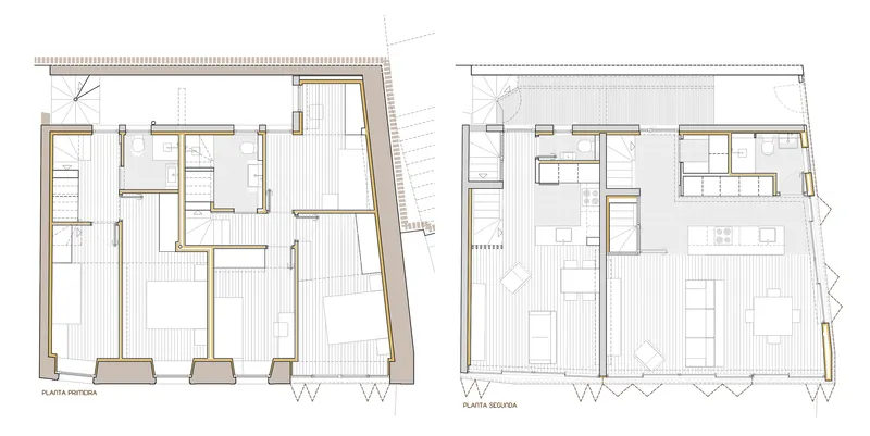Floor plan drawings showing two levels with irregular perimeter walls and interior room divisions