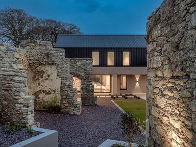 Steve Burke Builds His Parents a House That Treats Old Stone Ruins as the Main Event