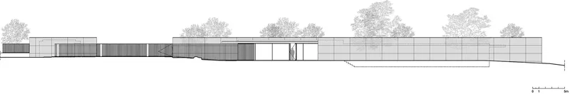 Elevation drawing depicting a low-slung linear structure with alternating solid and transparent bays flanked by trees