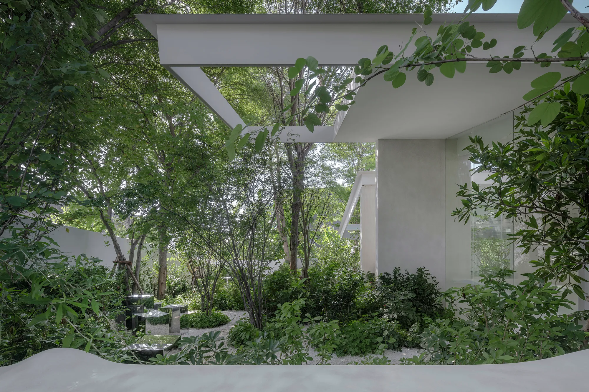 IDIN Architects Grows a Coffee Shop Out of the Jungle Beside Bangkok's Busiest Motorway