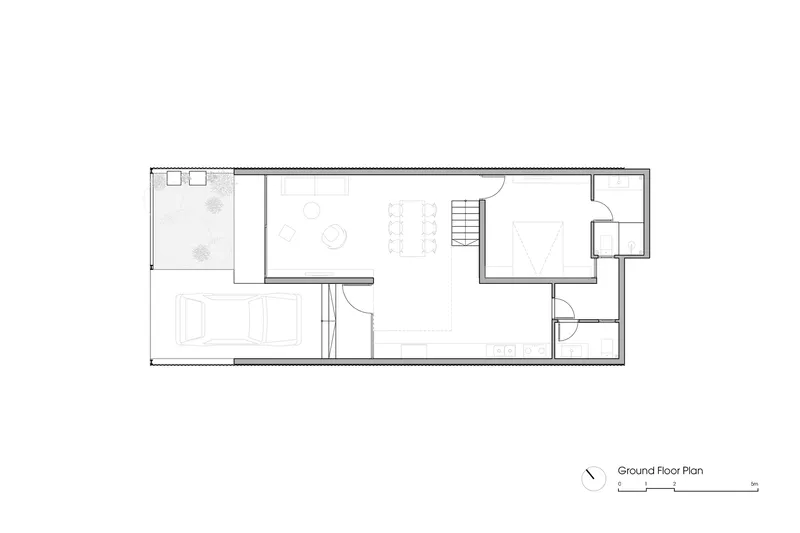 Ground floor plan drawing showing carport, living and dining areas, bedroom, and entry sequence