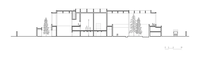 Section drawing showing interior spaces with clerestory windows and trees in courtyard areas