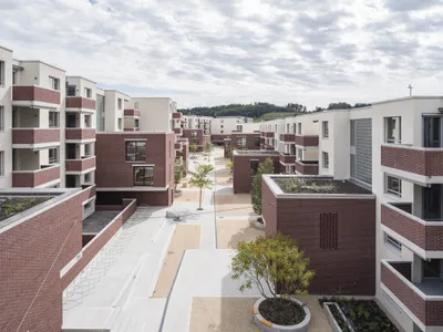 HILDEBRAND and Ruprecht Architekten Build a 217-Unit Neighborhood Machine in Brick Outside Bern