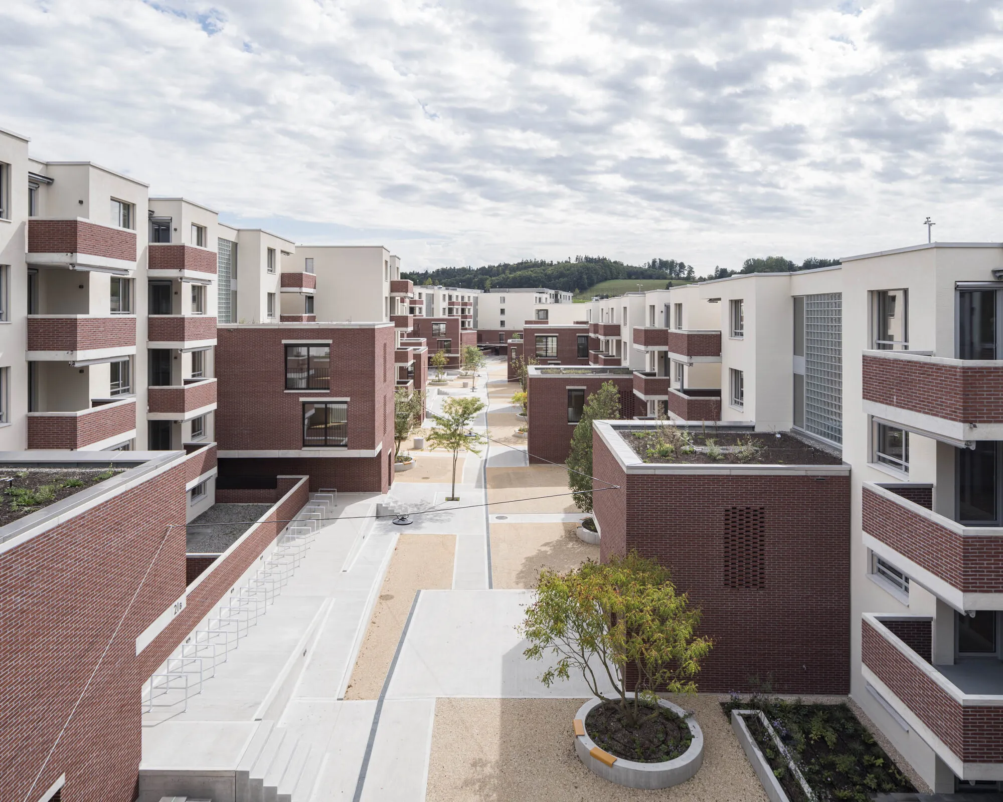 HILDEBRAND and Ruprecht Architekten Build a 217-Unit Neighborhood Machine in Brick Outside Bern
