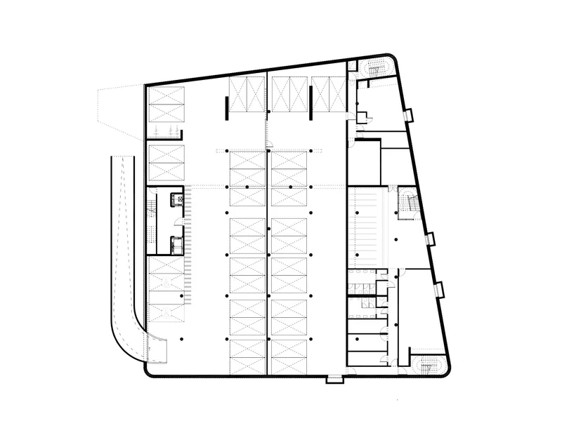 Floor plan drawing showing central open workspace surrounded by perimeter offices and circulation