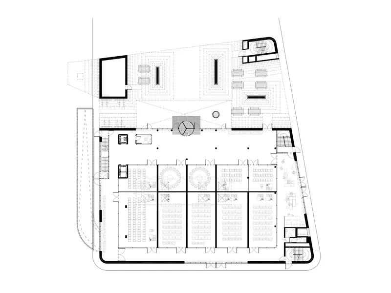 Floor plan drawing showing parking zone with rows of spaces and central circular stair core