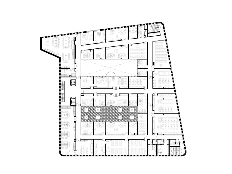 Floor plan drawing showing office layout with perimeter rooms surrounding central arched atrium space