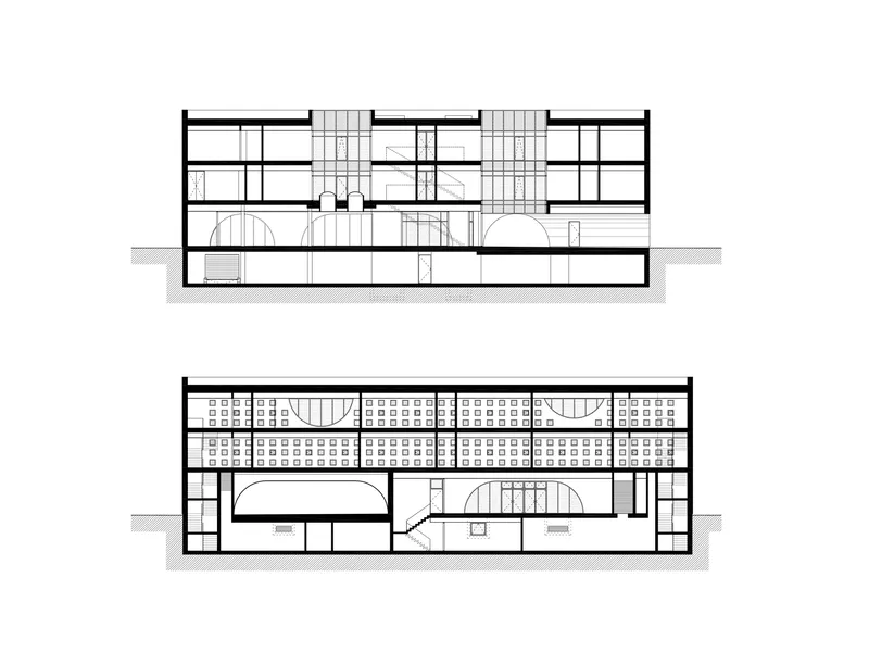 Section drawing showing two levels with arched openings and central stair connecting floor plates