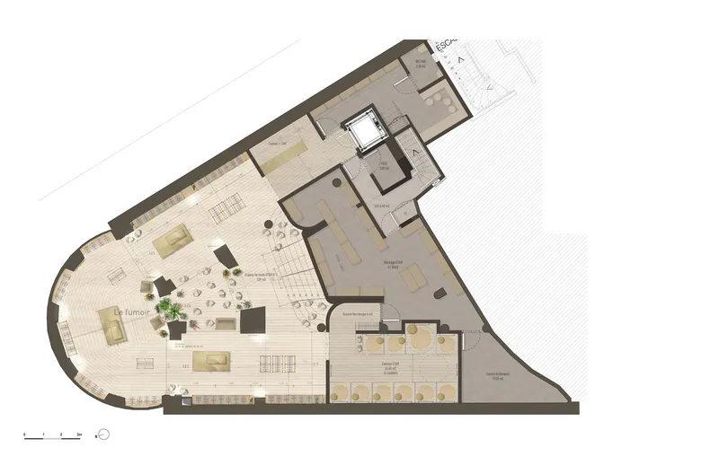 Floor plan drawing depicting an angled retail level with defined service zones and scattered display areas