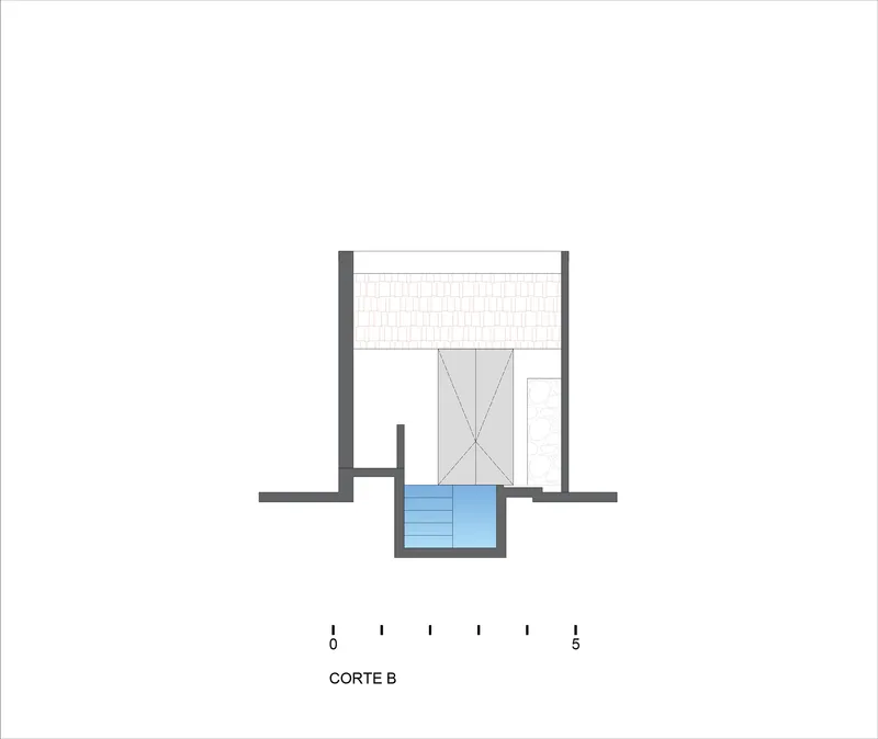 Section drawing showing a double-height space with pivot door and sunken pool below ground level