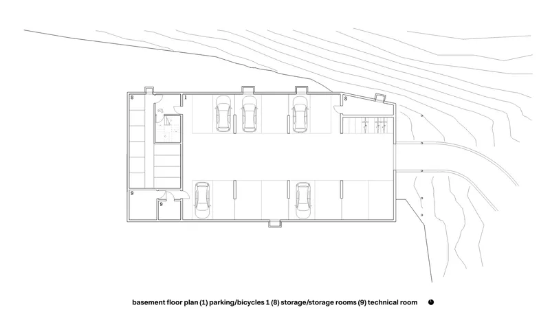 Basement floor plan drawing showing parking bays and storage rooms with topographic contours