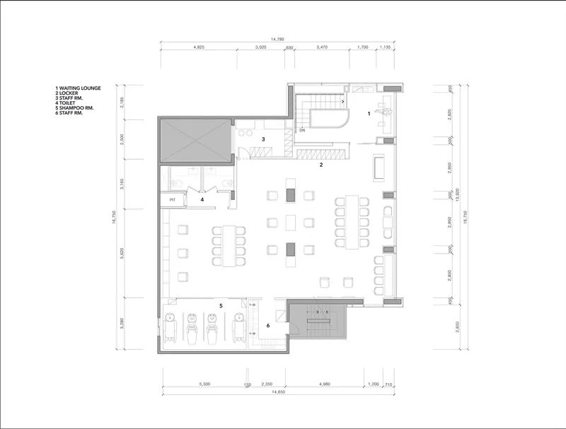 Floor plan drawing showing a waiting lounge with dining area and adjacent restroom and stairway facilities